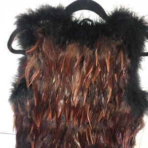 FEATHER VEST